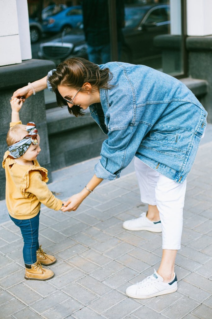 parent and child talking and playing